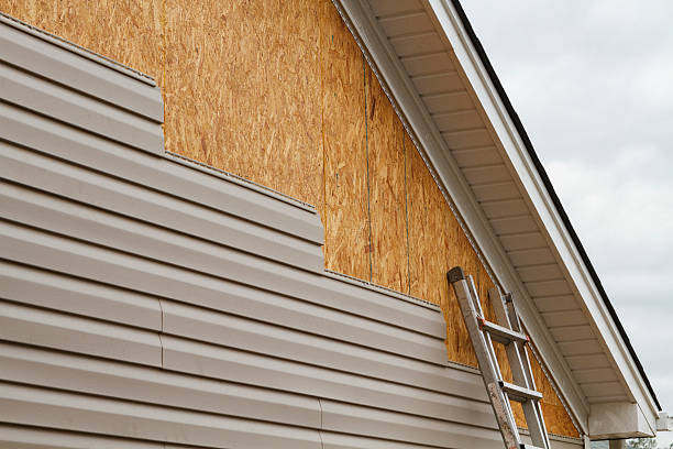 Professional Siding Contractor technician working in Mattapan, MA